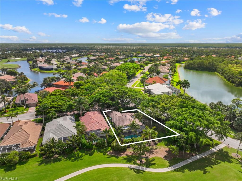 6903 Mauna Loa Lane Naples, FL 34113 - Photo 6 of 46 a view of a lake