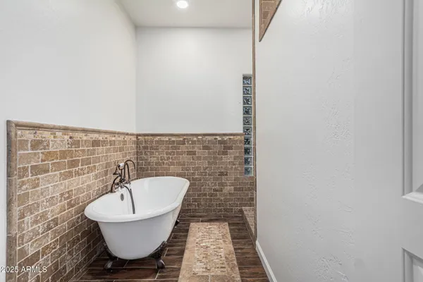 a bathroom with a sink and a bathtub