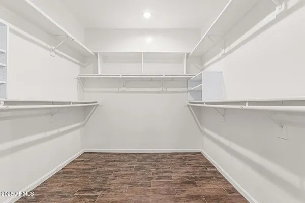 a view of an empty walk in closet
