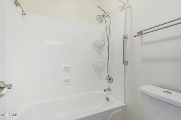a bathroom with a bathtub