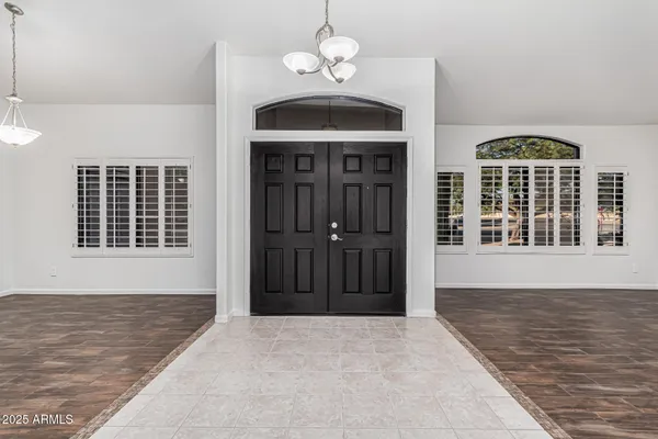 a view of empty room with windows