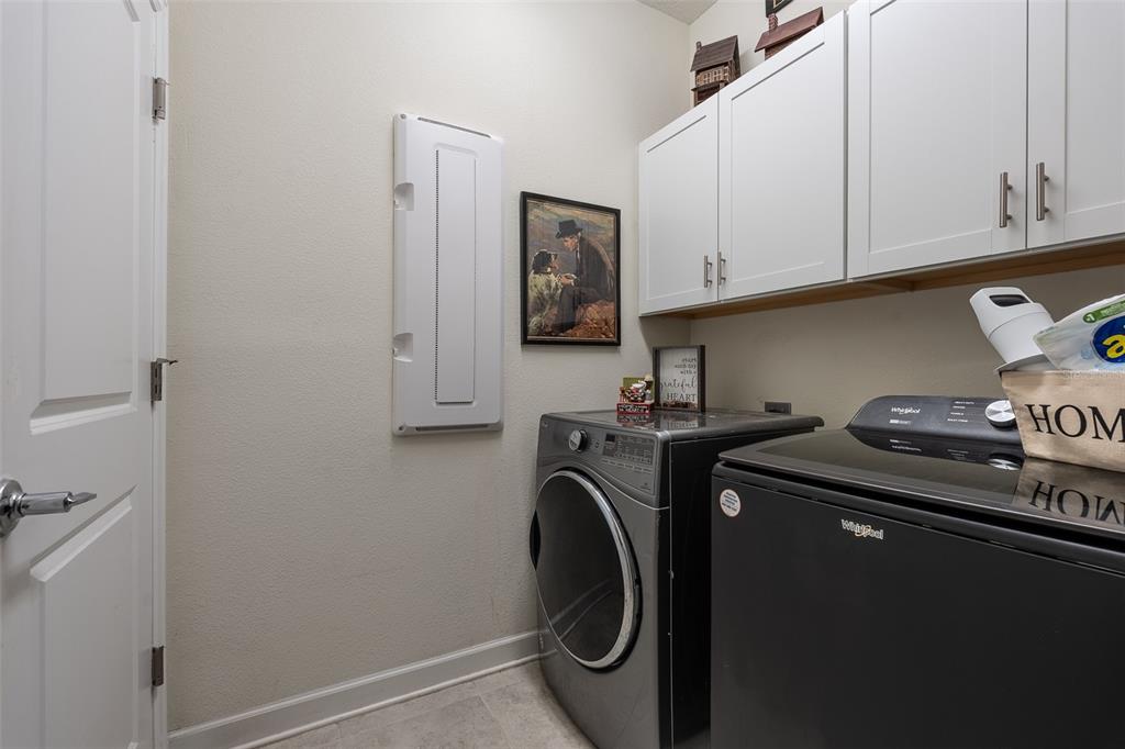9224 Southwest 60th Ct Road Ocala, FL 34476 - Photo 42 of 55 a utility room with sink dryer and washer