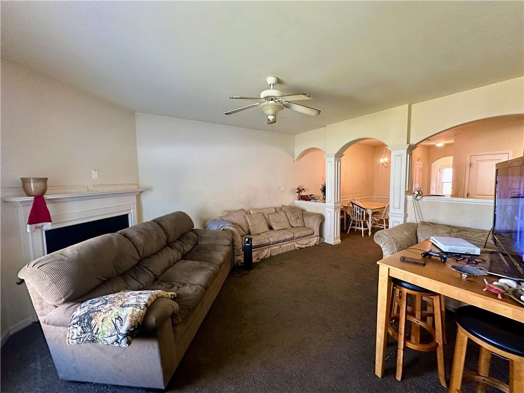 2655 Avanti Way Decatur, GA 30035 - Photo 5 of 12 a living room with furniture and a chandelier