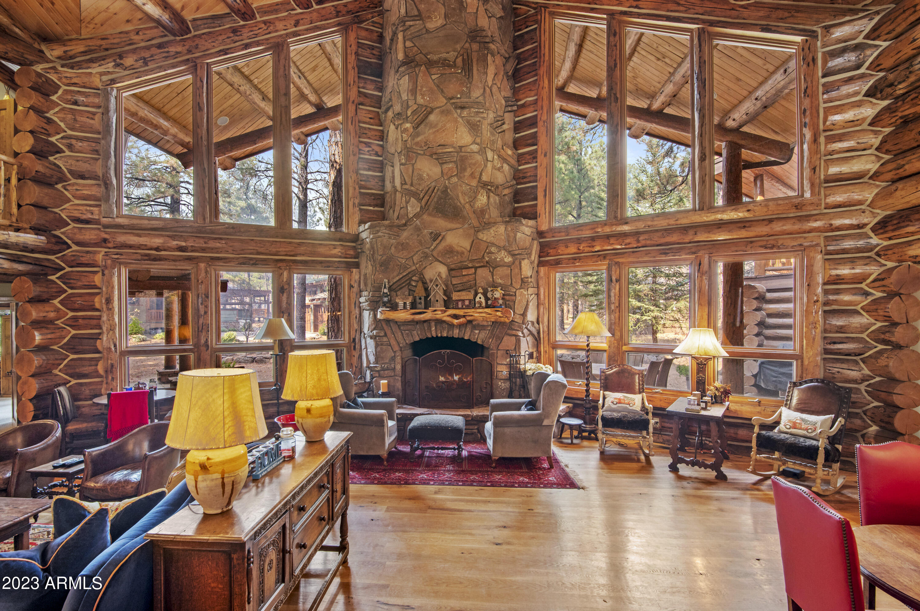 3905 Doc Raymond Flagstaff, AZ 86005 - Photo 11 of 43 a view of a patio with couches table and chairs and potted plants
