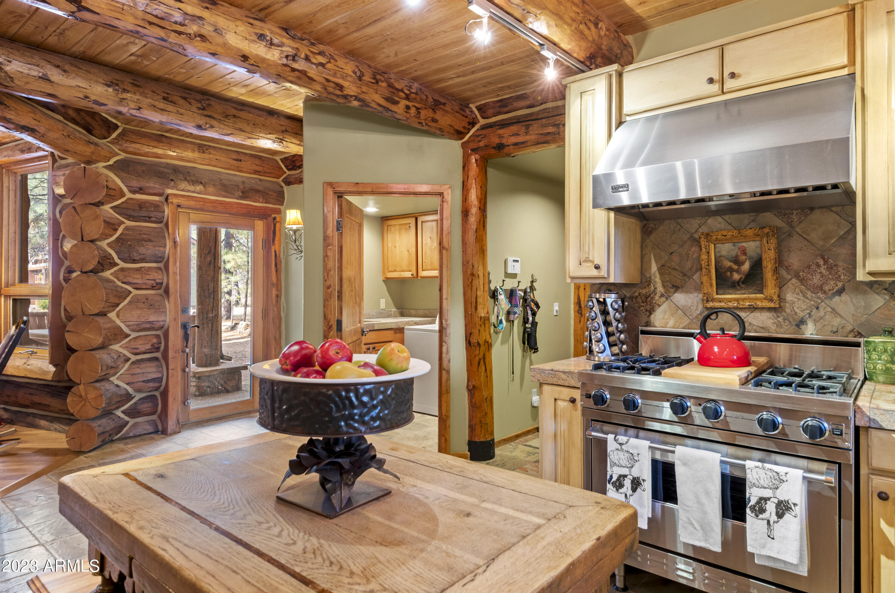 3905 Doc Raymond Flagstaff, AZ 86005 - Photo 16 of 43 a kitchen with a stove and a refrigerator