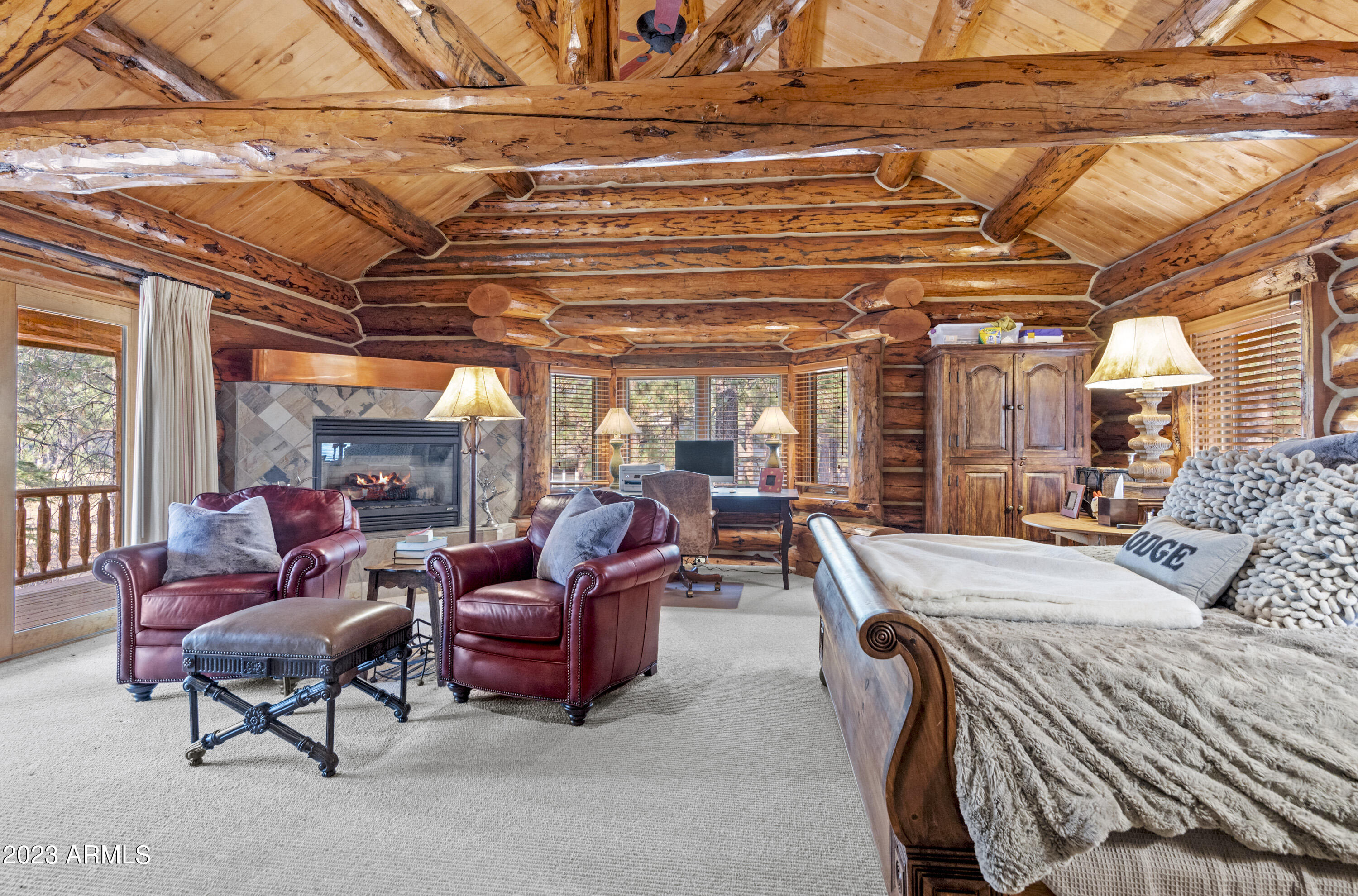 3905 Doc Raymond Flagstaff, AZ 86005 - Photo 21 of 43 a living room with furniture and a chandelier