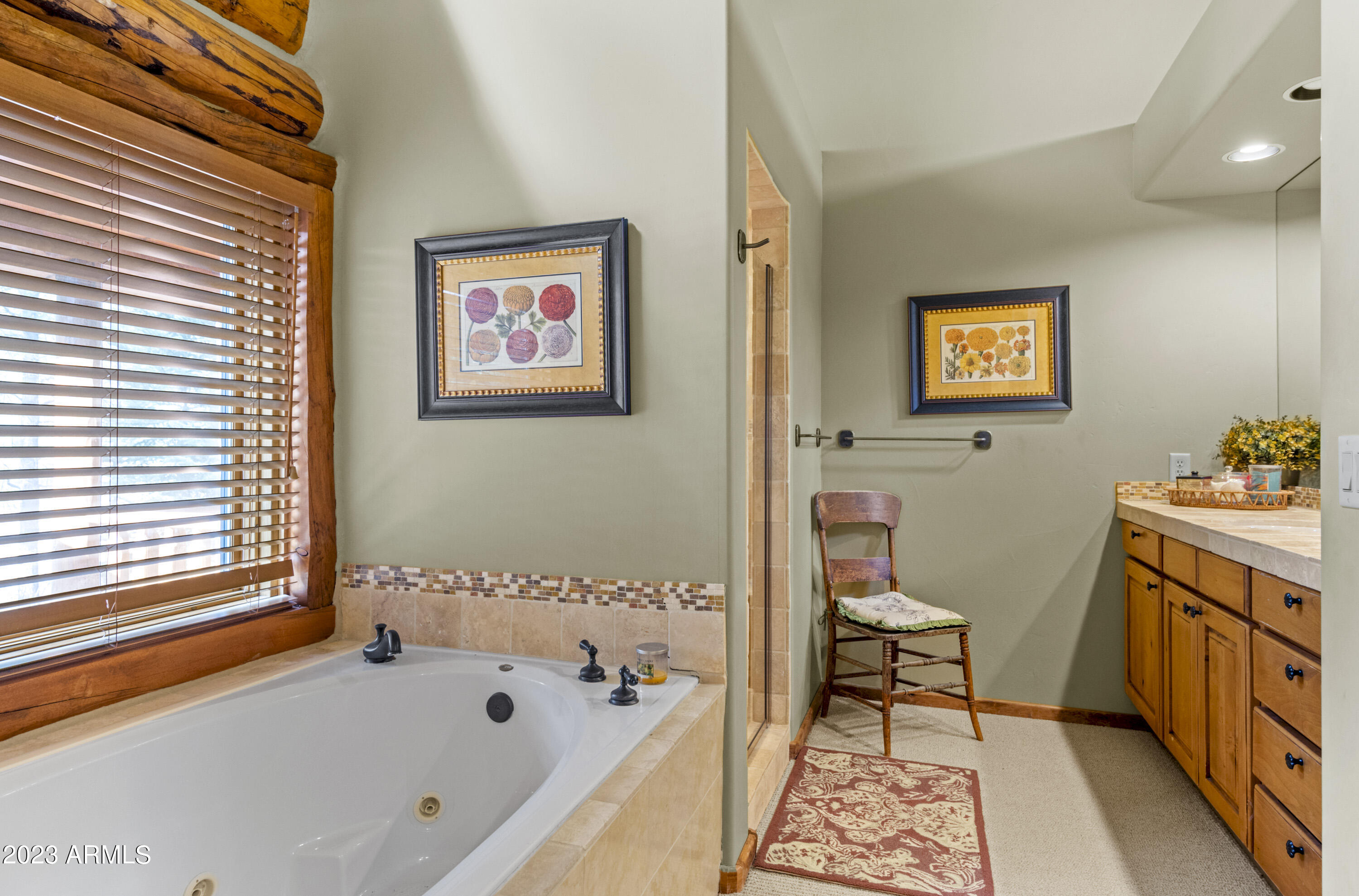 3905 Doc Raymond Flagstaff, AZ 86005 - Photo 24 of 43 a bathroom with a bathtub and a window