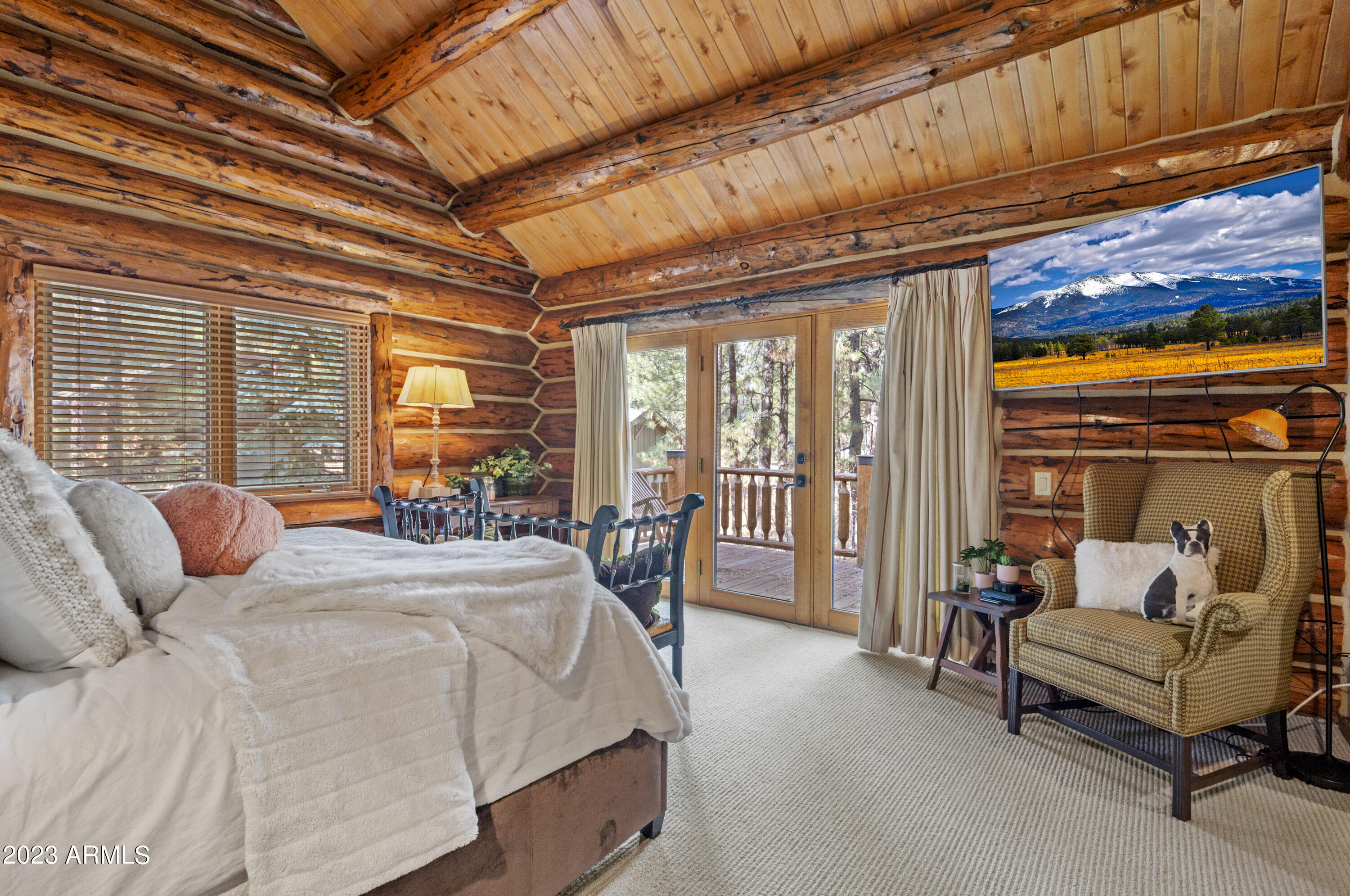 3905 Doc Raymond Flagstaff, AZ 86005 - Photo 25 of 43 a bedroom with furniture and large windows