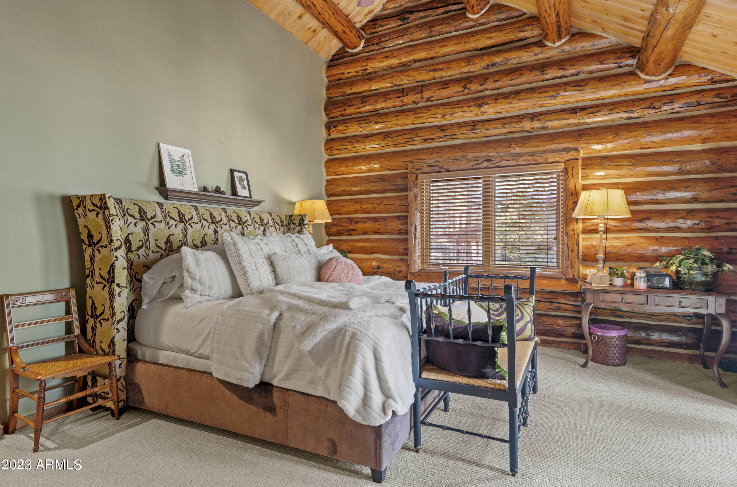 3905 Doc Raymond Flagstaff, AZ 86005 - Photo 26 of 43 a bedroom with a bed and a table