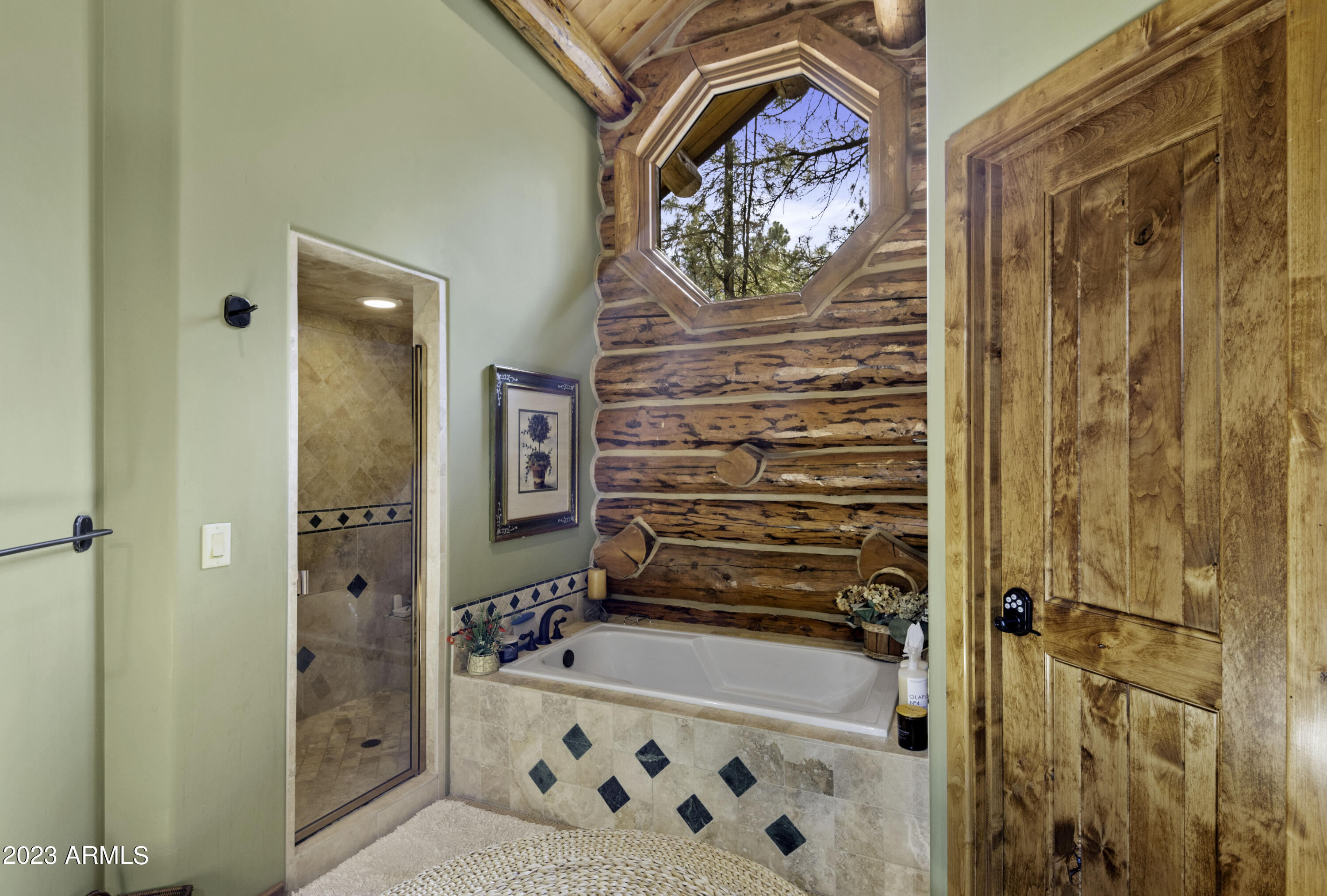 3905 Doc Raymond Flagstaff, AZ 86005 - Photo 27 of 43 a bathroom with a bathtub and a shower