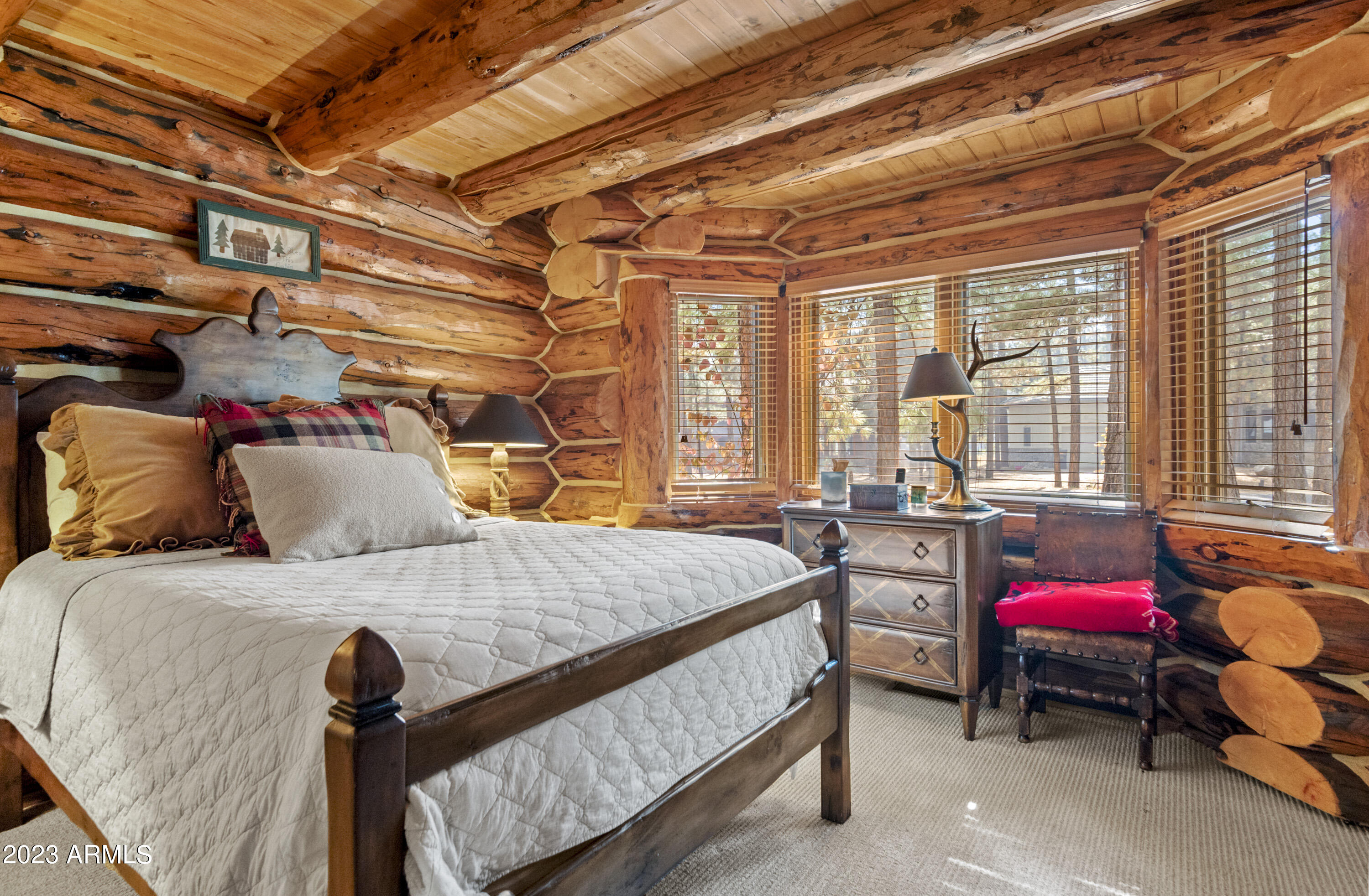 3905 Doc Raymond Flagstaff, AZ 86005 - Photo 29 of 43 a bed room with a bed and a chair