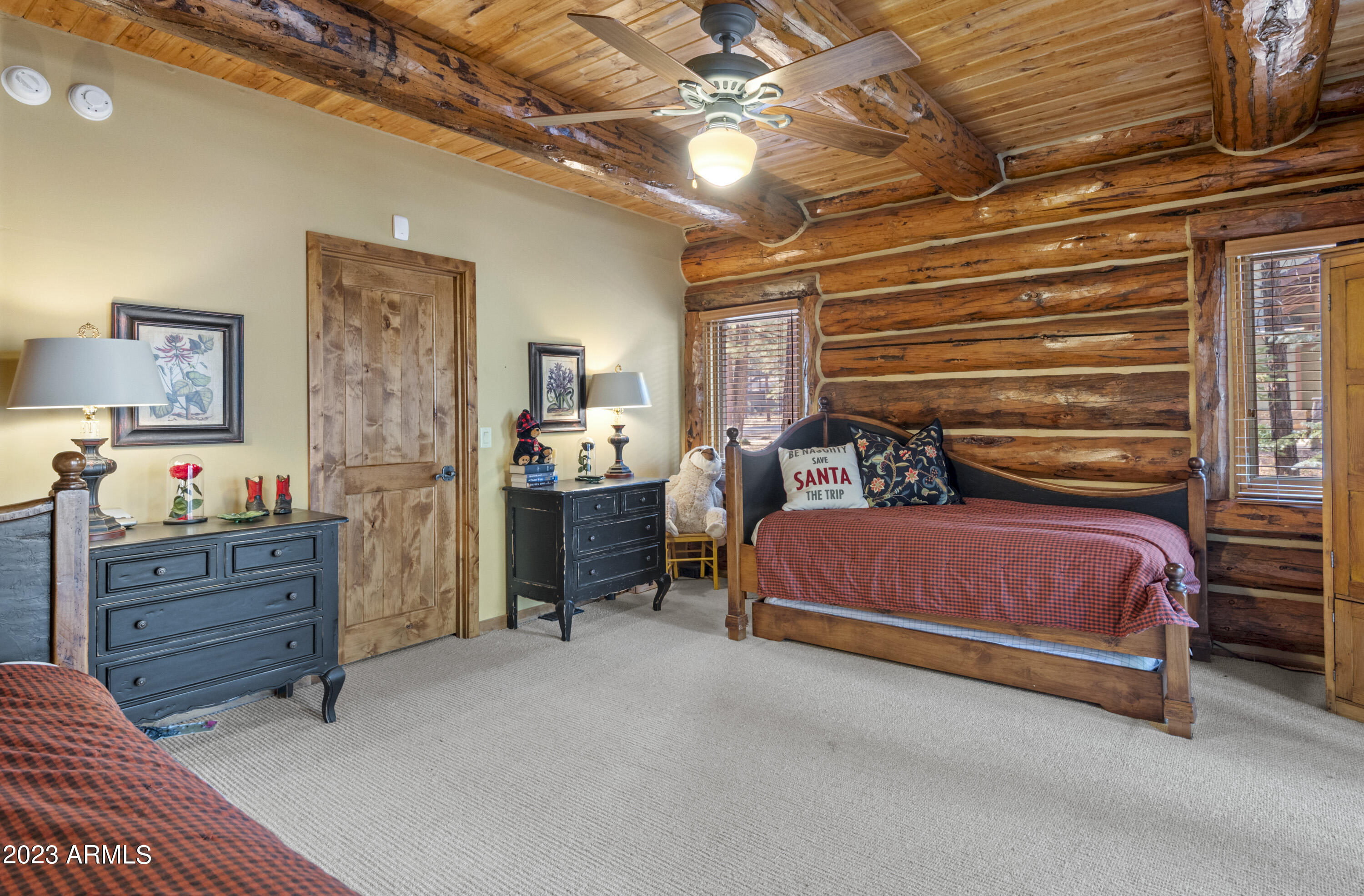 3905 Doc Raymond Flagstaff, AZ 86005 - Photo 31 of 43 a bedroom with a bed and furniture