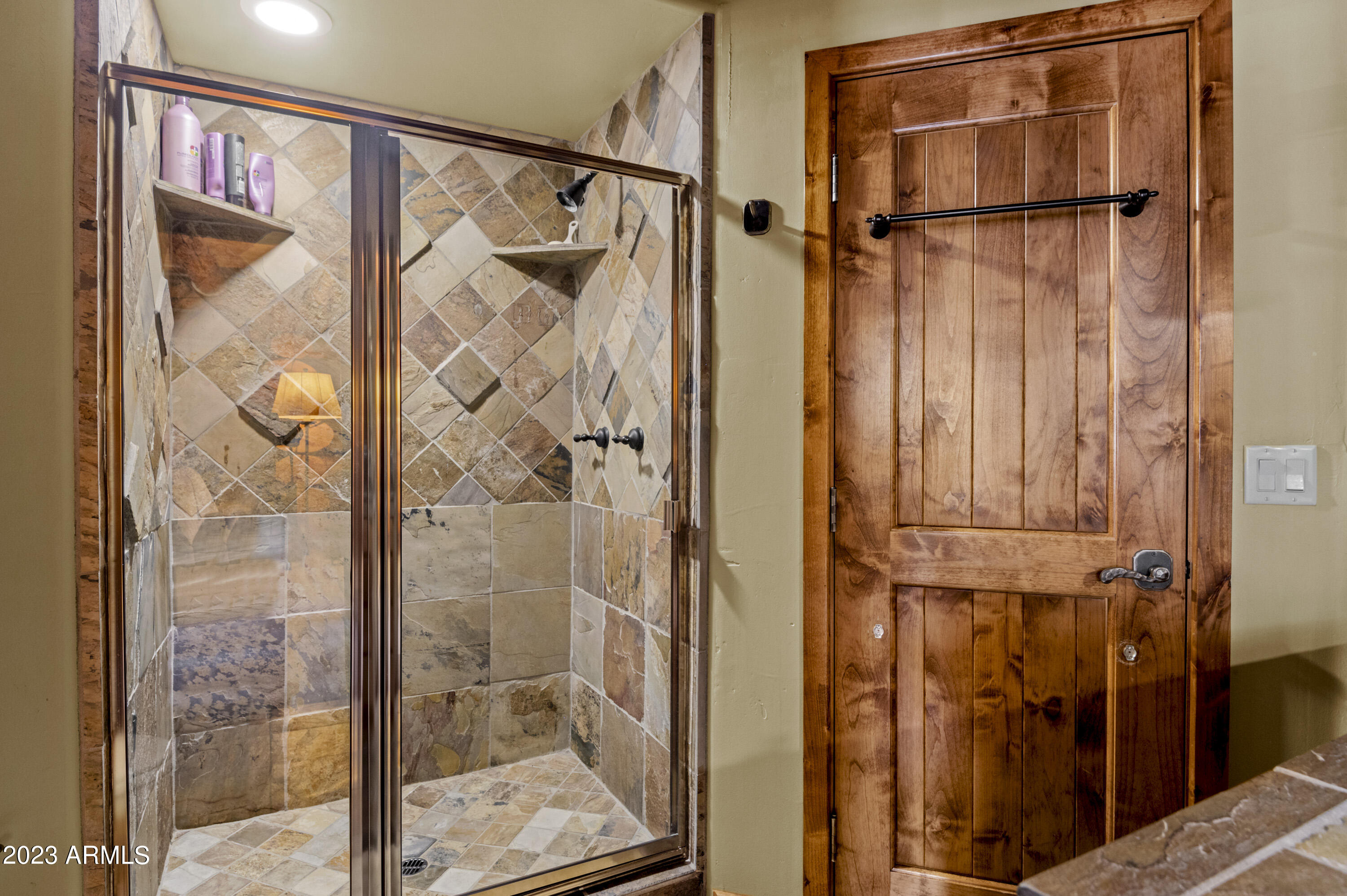 3905 Doc Raymond Flagstaff, AZ 86005 - Photo 33 of 43 a bathroom with a shower and a glass door