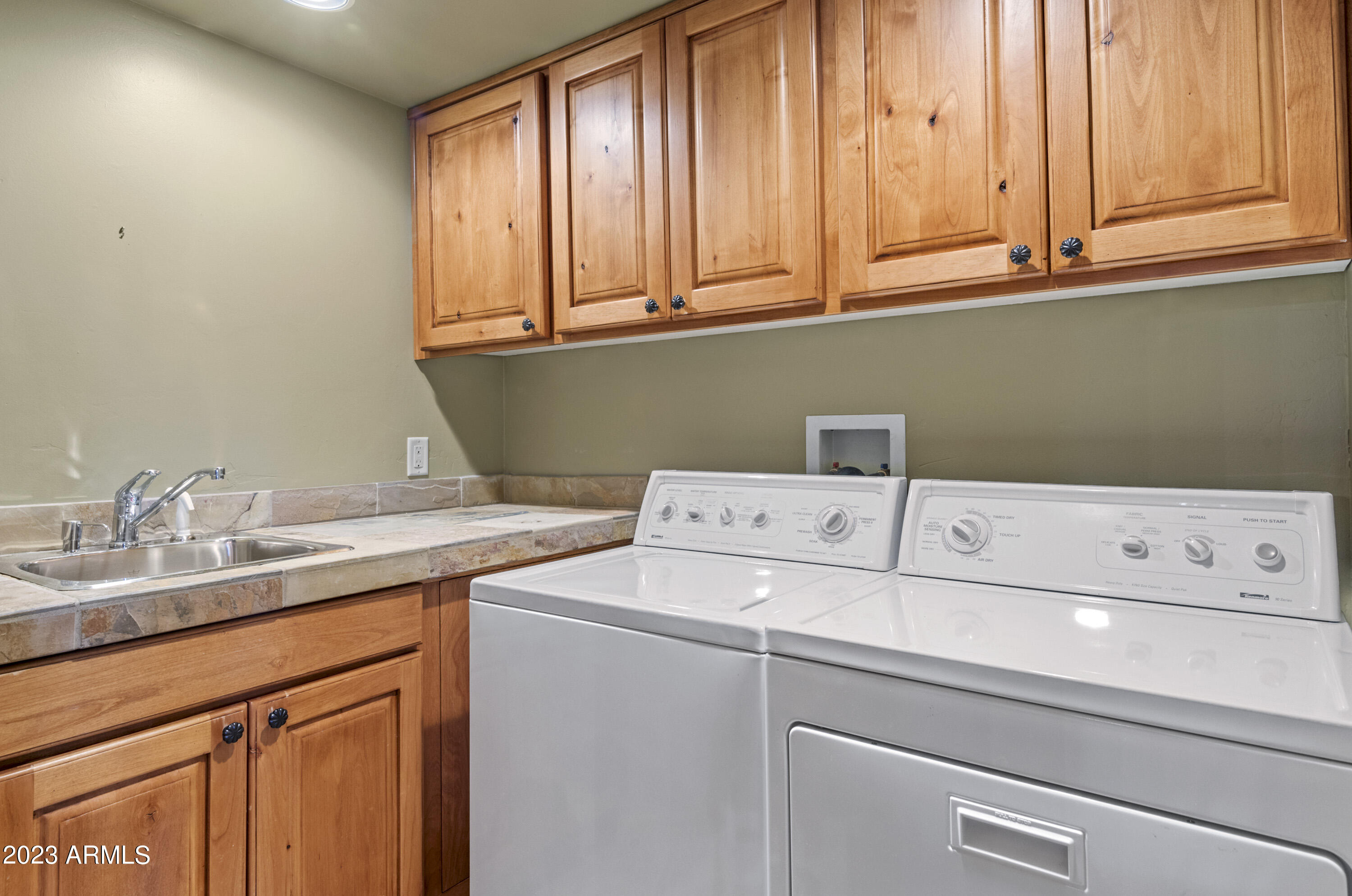 3905 Doc Raymond Flagstaff, AZ 86005 - Photo 36 of 43 a utility room with dryer and washer