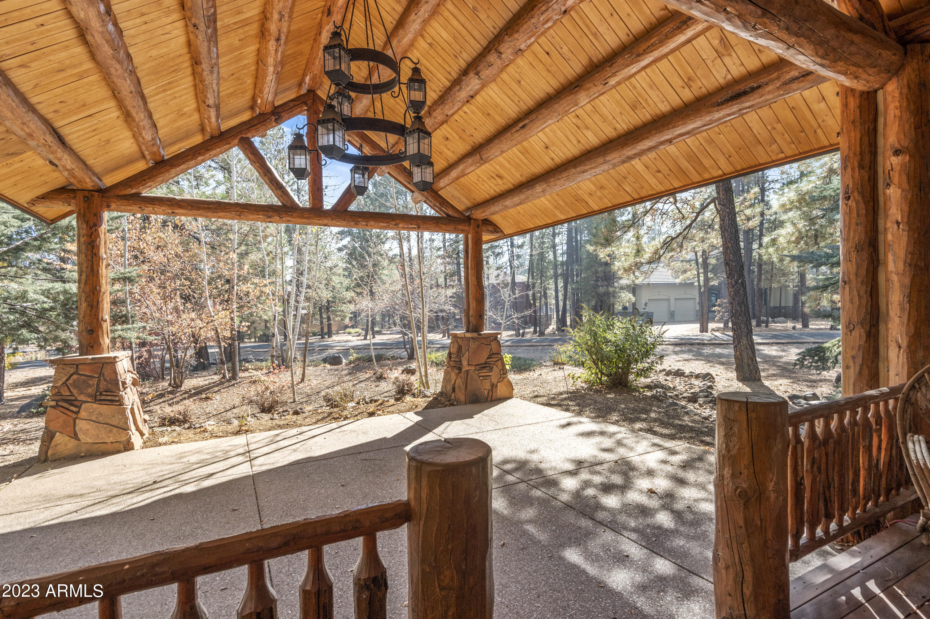 3905 Doc Raymond Flagstaff, AZ 86005 - Photo 5 of 43 a view of trees and patio with a yard