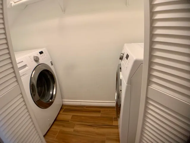 a utility room with dryer and washer