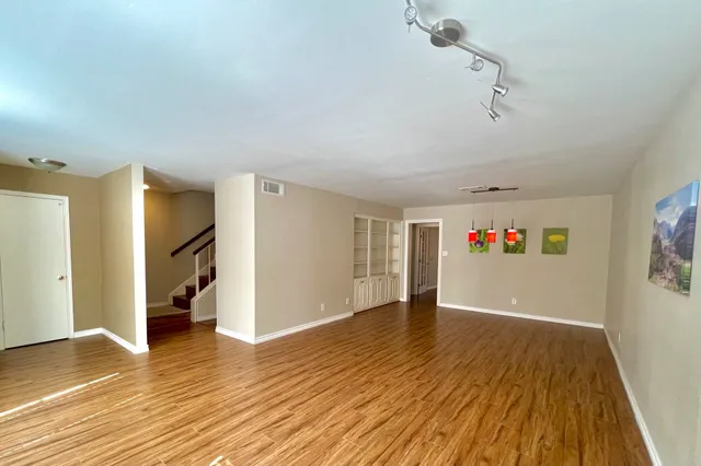 a view of livingroom with hardwood floor and window