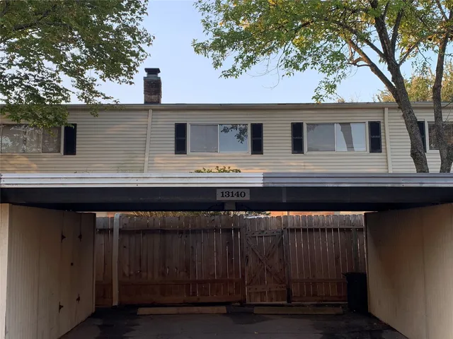 a house view with a outdoor space