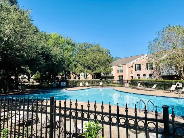 a view of a chairs and tables in the patio