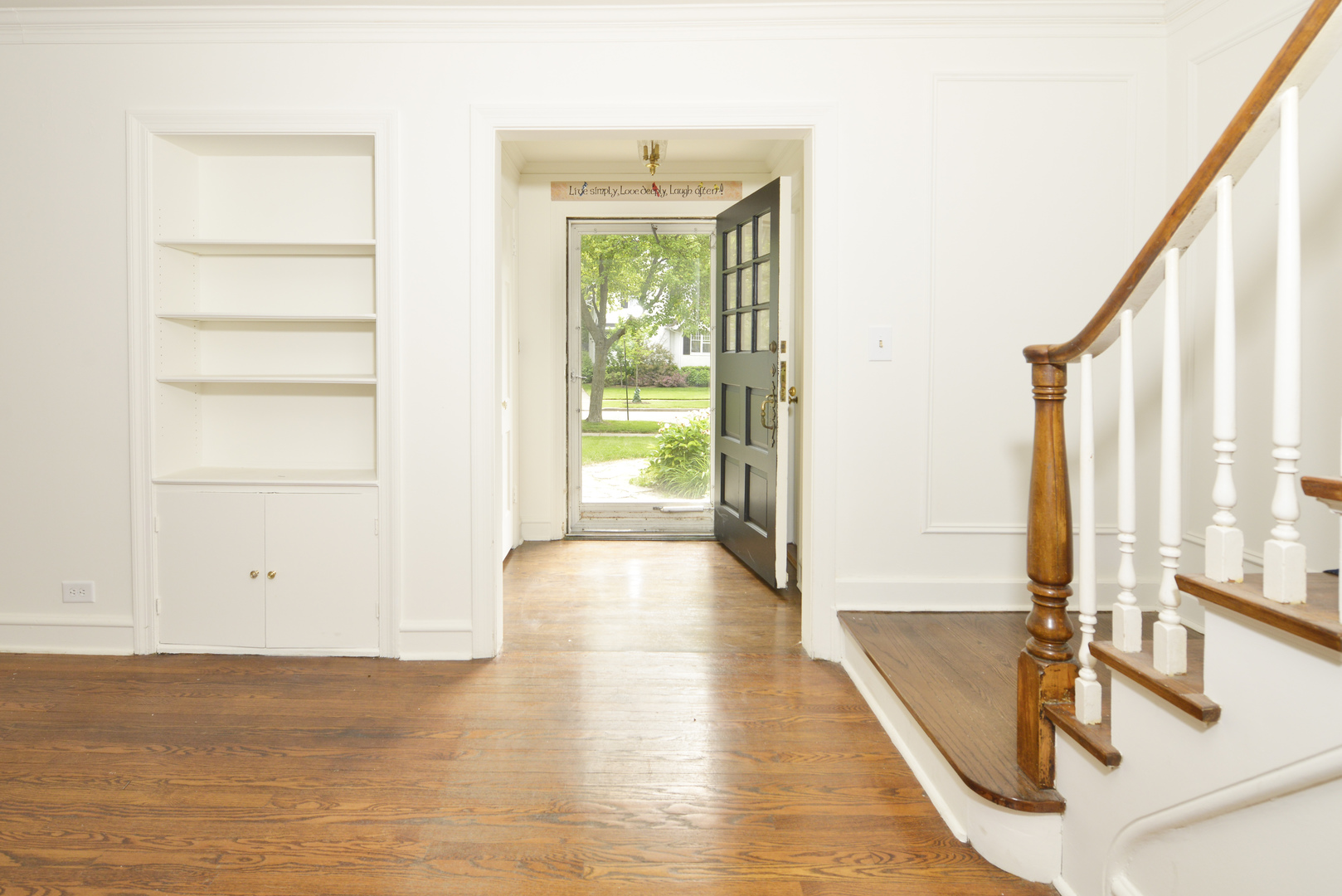 82 Warwick Road Winnetka, IL 60093 - Photo 2 of 24 a view of a room with wooden floor and windows
