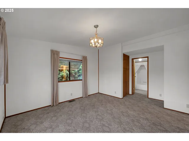 a view of an empty room with window