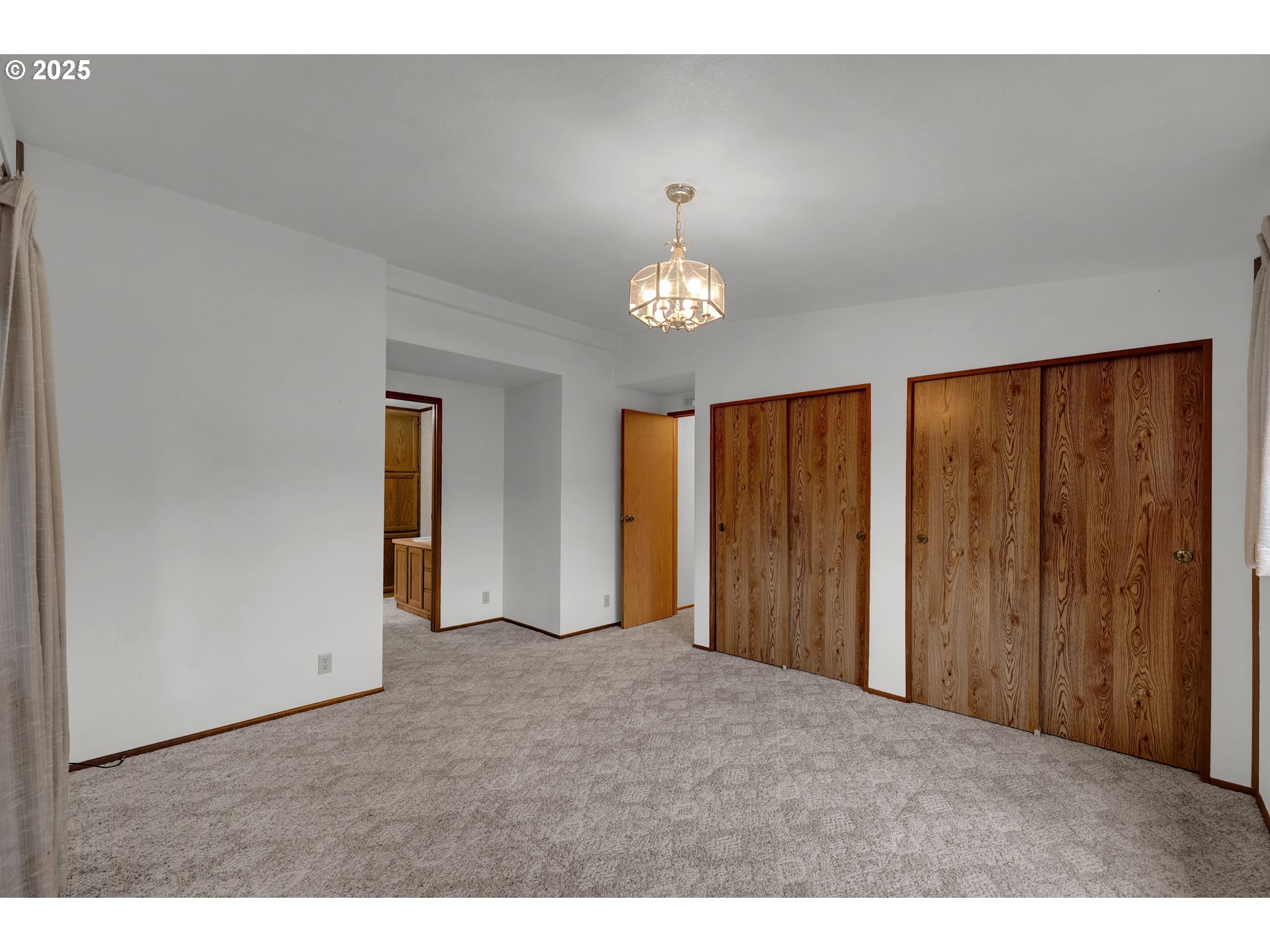 1199 North Terry Street, Unit 366 Eugene, OR 97402 - Photo 13 of 32 a view of an empty room with a window