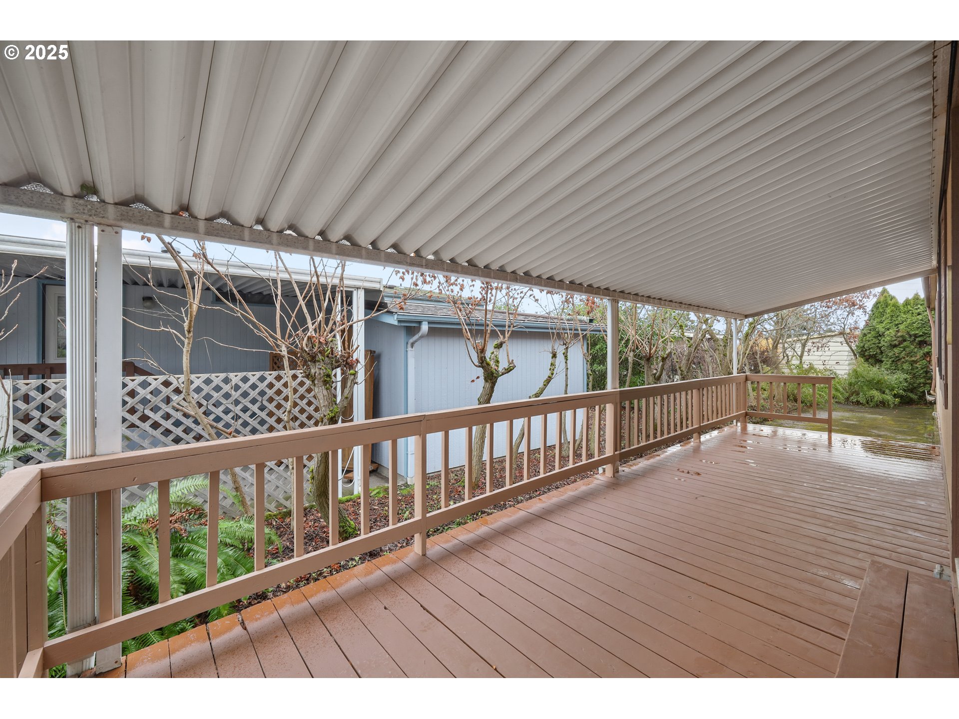 1199 North Terry Street, Unit 366 Eugene, OR 97402 - Photo 22 of 32 a view of balcony with wooden floor