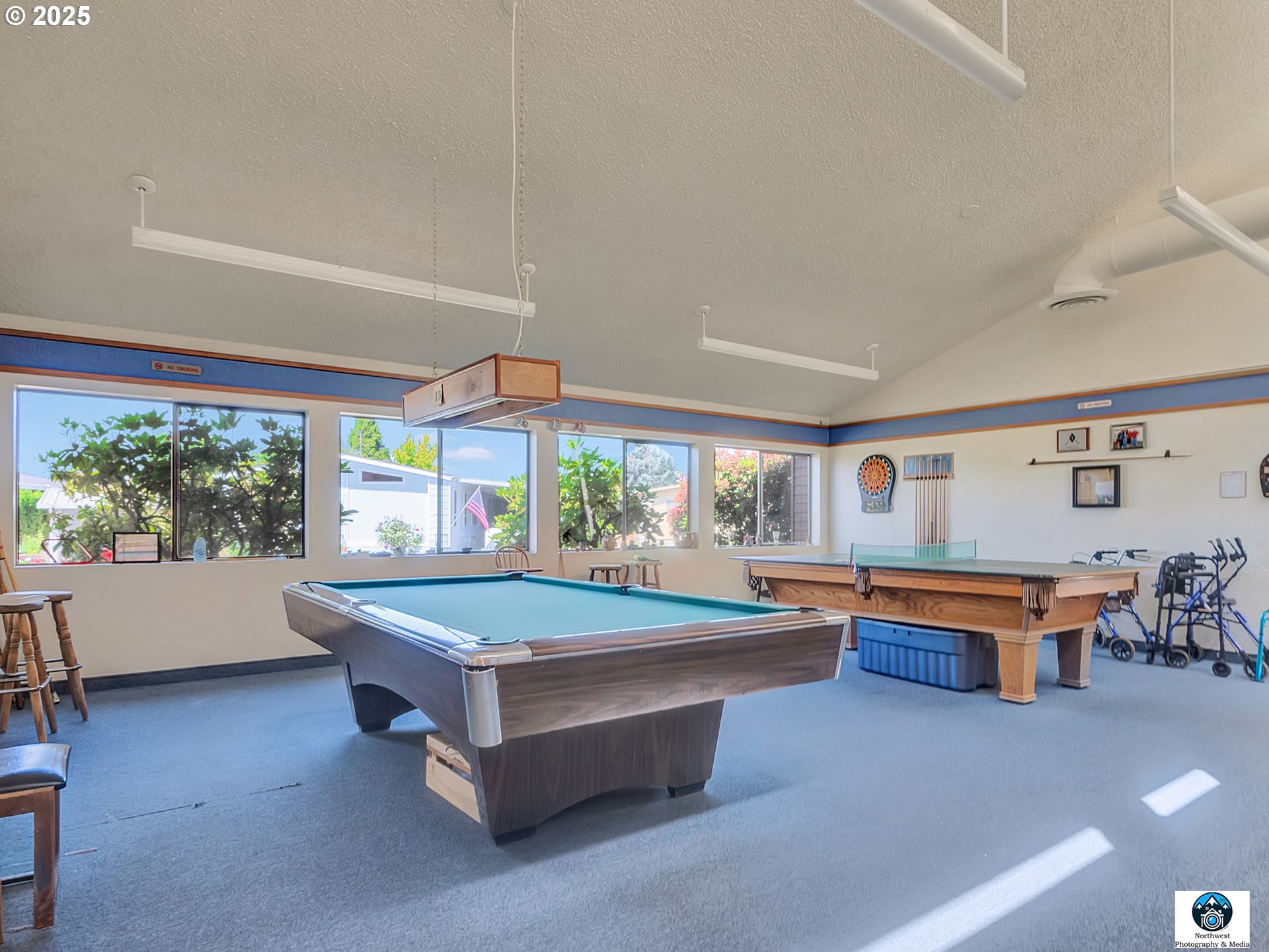 1199 North Terry Street, Unit 366 Eugene, OR 97402 - Photo 29 of 32 a room with pool table and windows