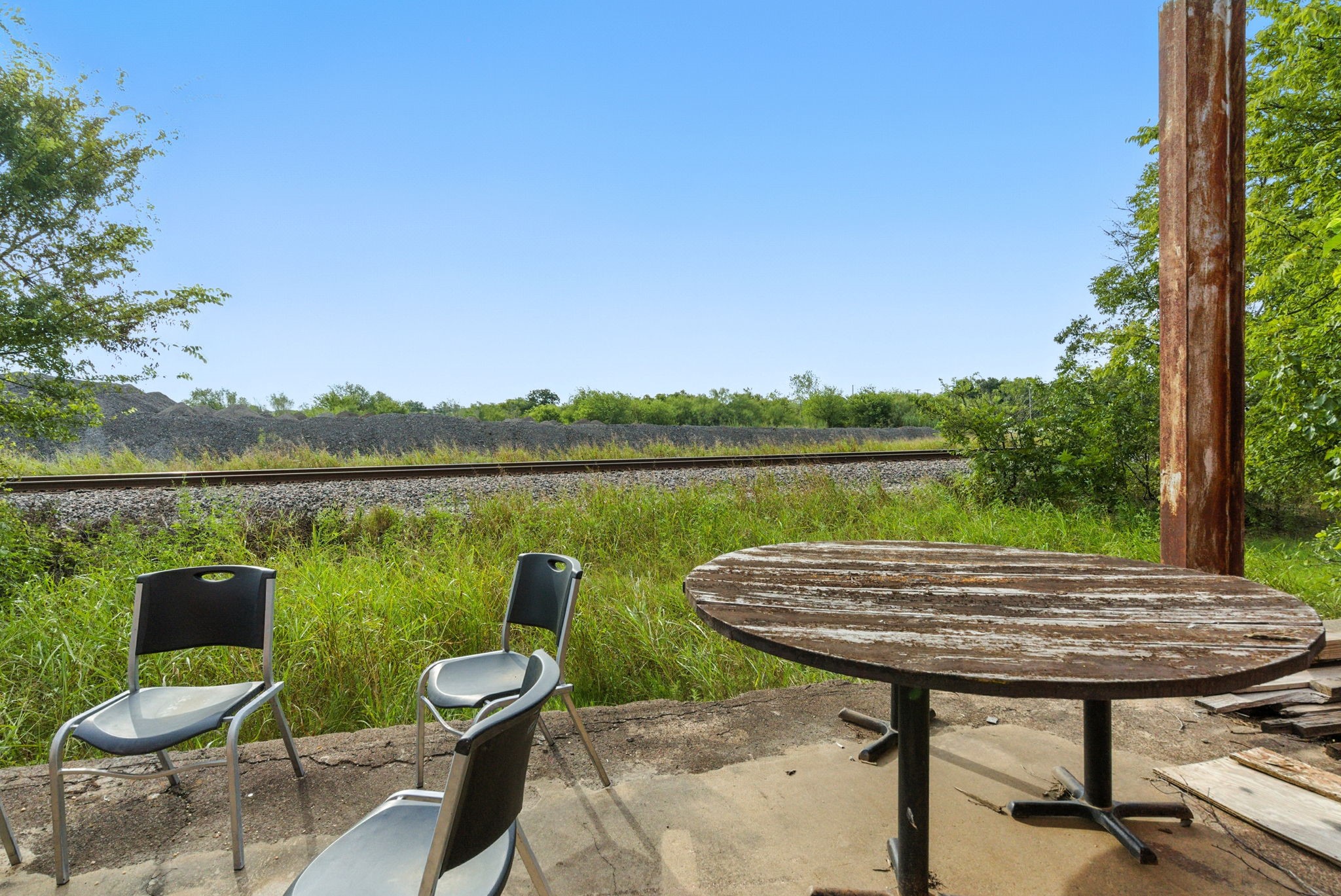 438 Melvin Street Ranger, TX 76470 - Photo 13 of 44 a view of a lake with table and chairs