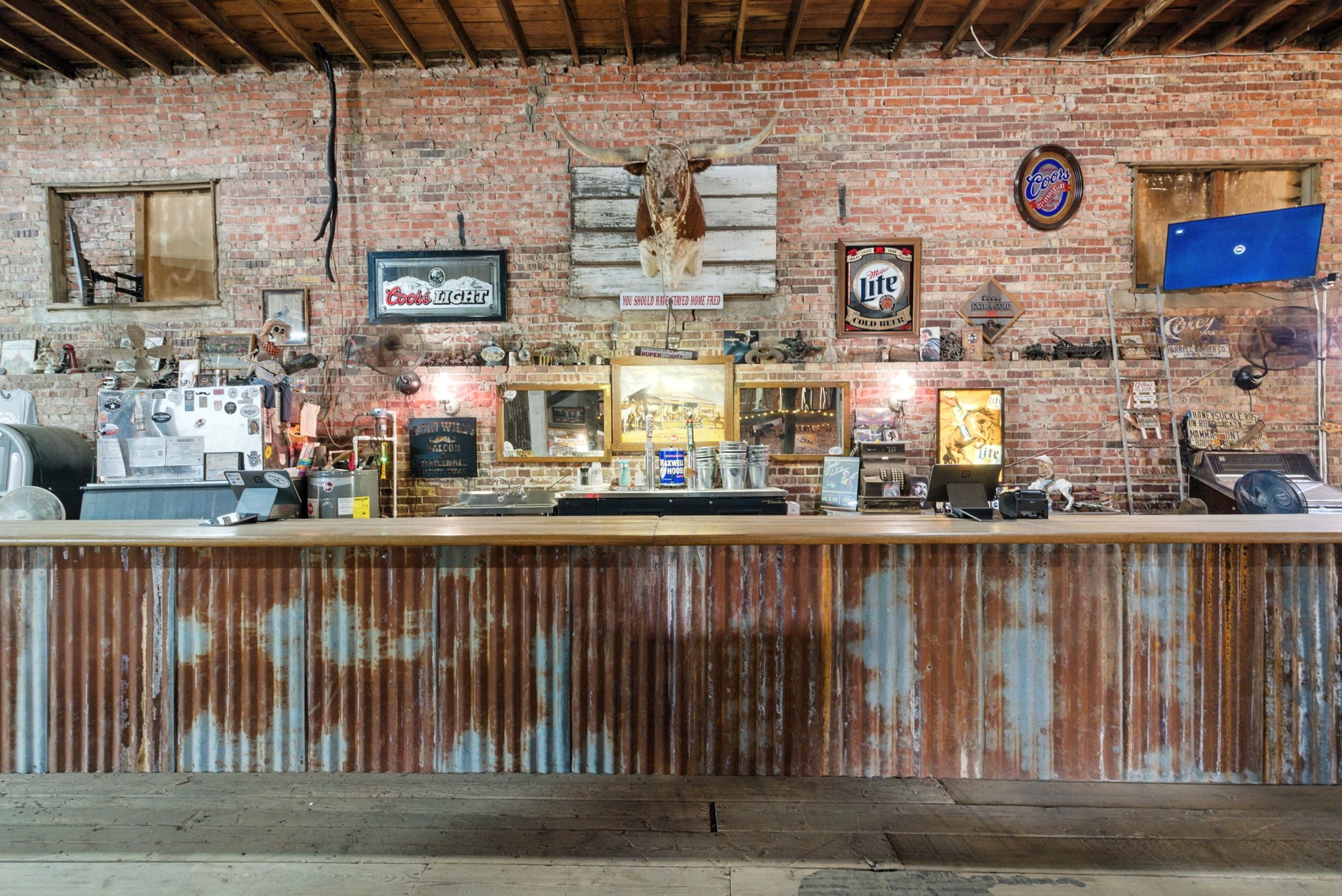 438 Melvin Street Ranger, TX 76470 - Photo 14 of 44 a kitchen with a wooden floor