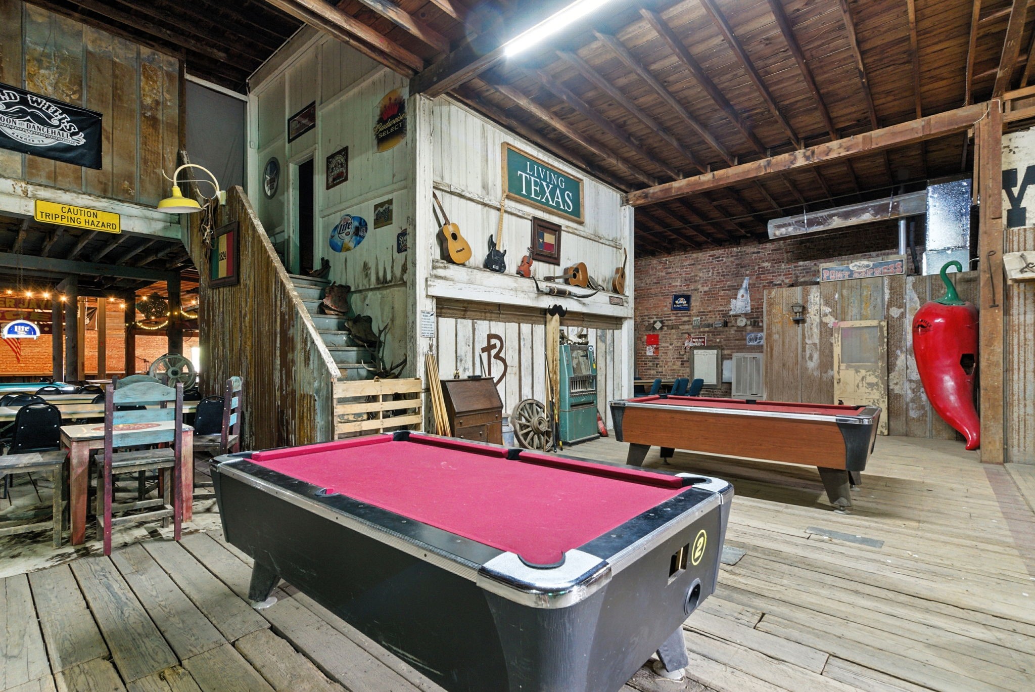 438 Melvin Street Ranger, TX 76470 - Photo 17 of 44 a room with pool table table and chairs