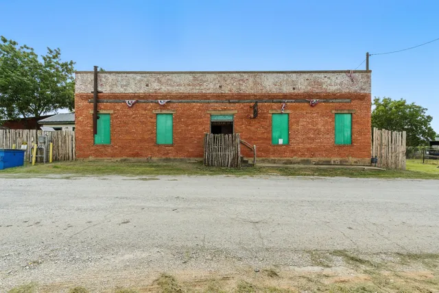 a view of street with sitting area