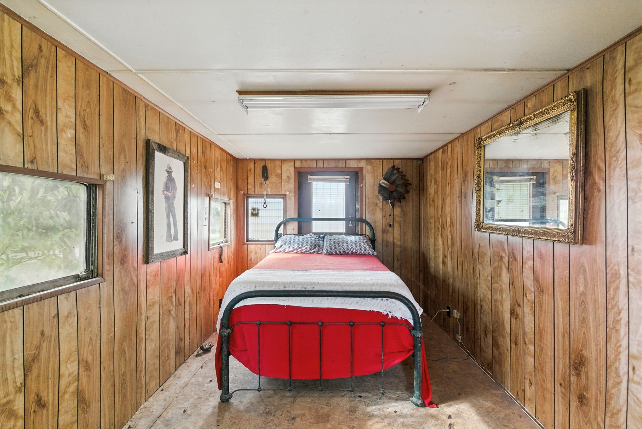 438 Melvin Street Ranger, TX 76470 - Photo 27 of 44 a bed room with a bed and a window