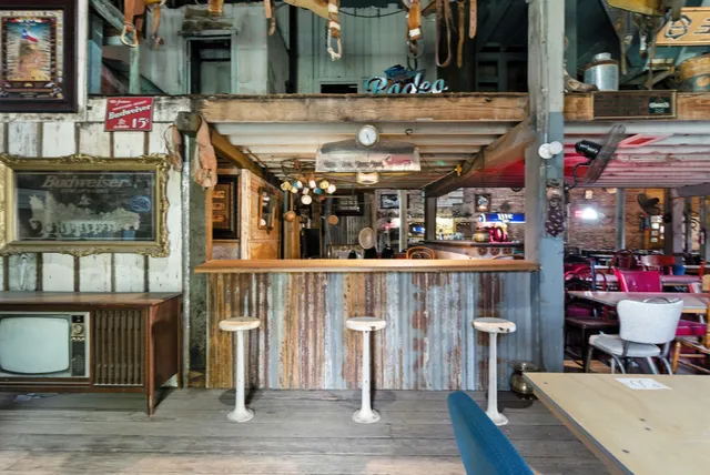 a view of a chairs and tables in patio