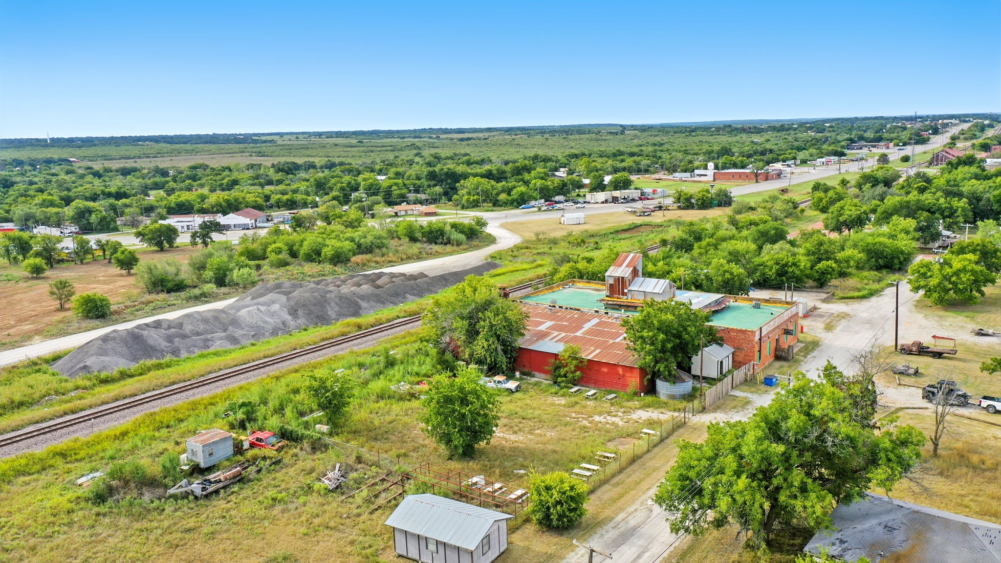 438 Melvin Street Ranger, TX 76470 - Photo 3 of 44 an aerial view of residential houses with outdoor space