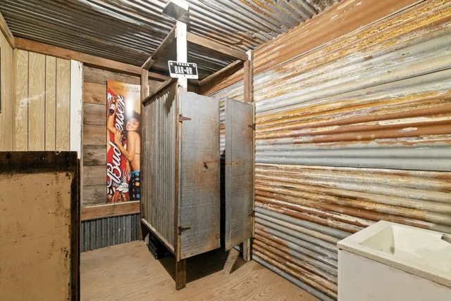 a view of a chairs and table in the patio