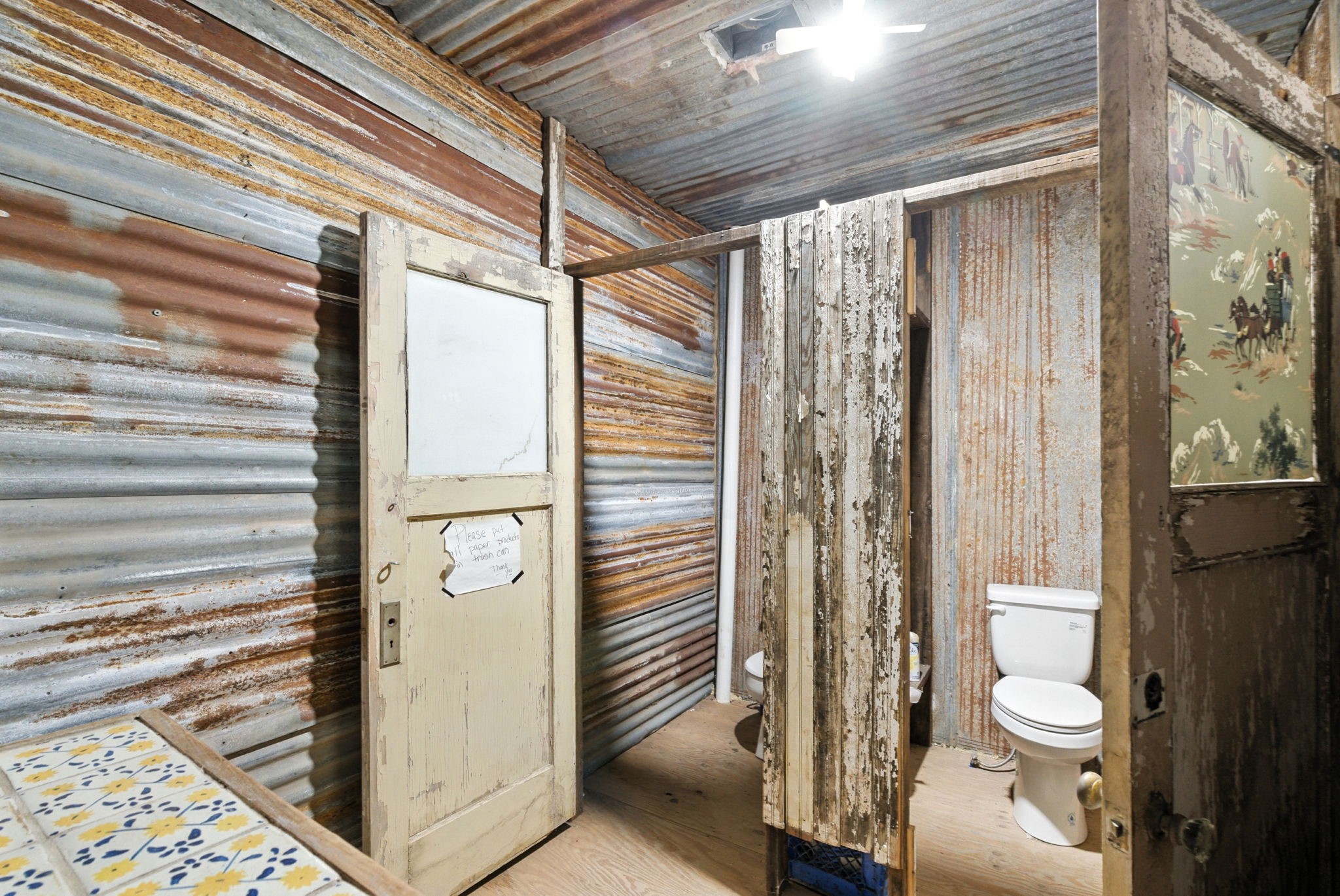 438 Melvin Street Ranger, TX 76470 - Photo 34 of 44 a bathroom with a toilet and a shower
