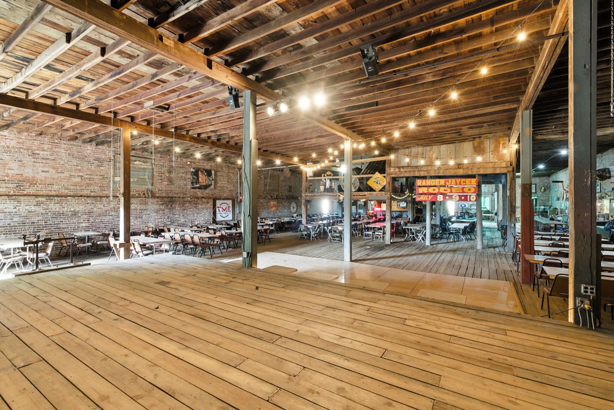 438 Melvin Street Ranger, TX 76470 - Photo 36 of 44 a view of a hall with wooden floor