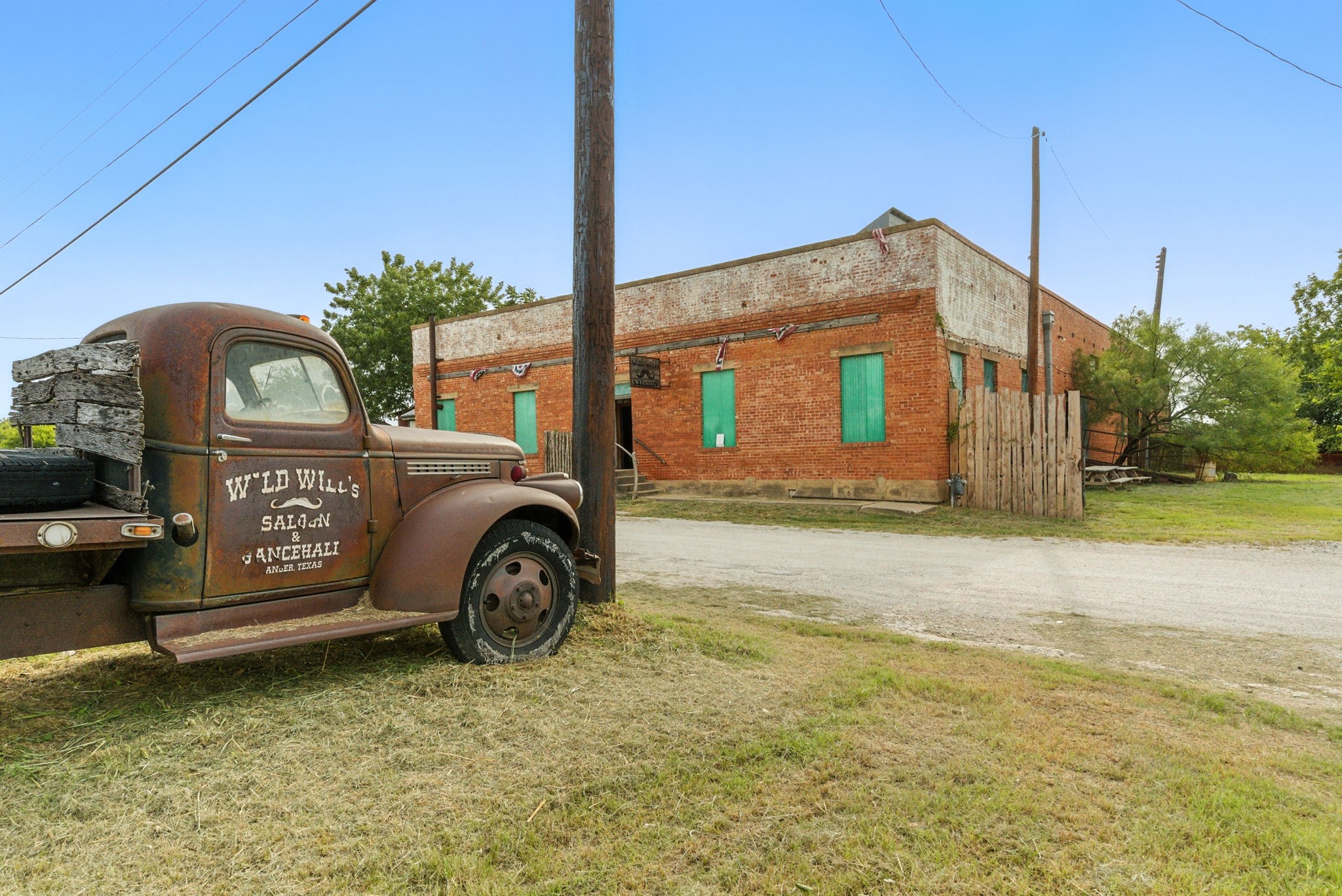 438 Melvin Street Ranger, TX 76470 - Photo 40 of 44 a front view of a house with garden