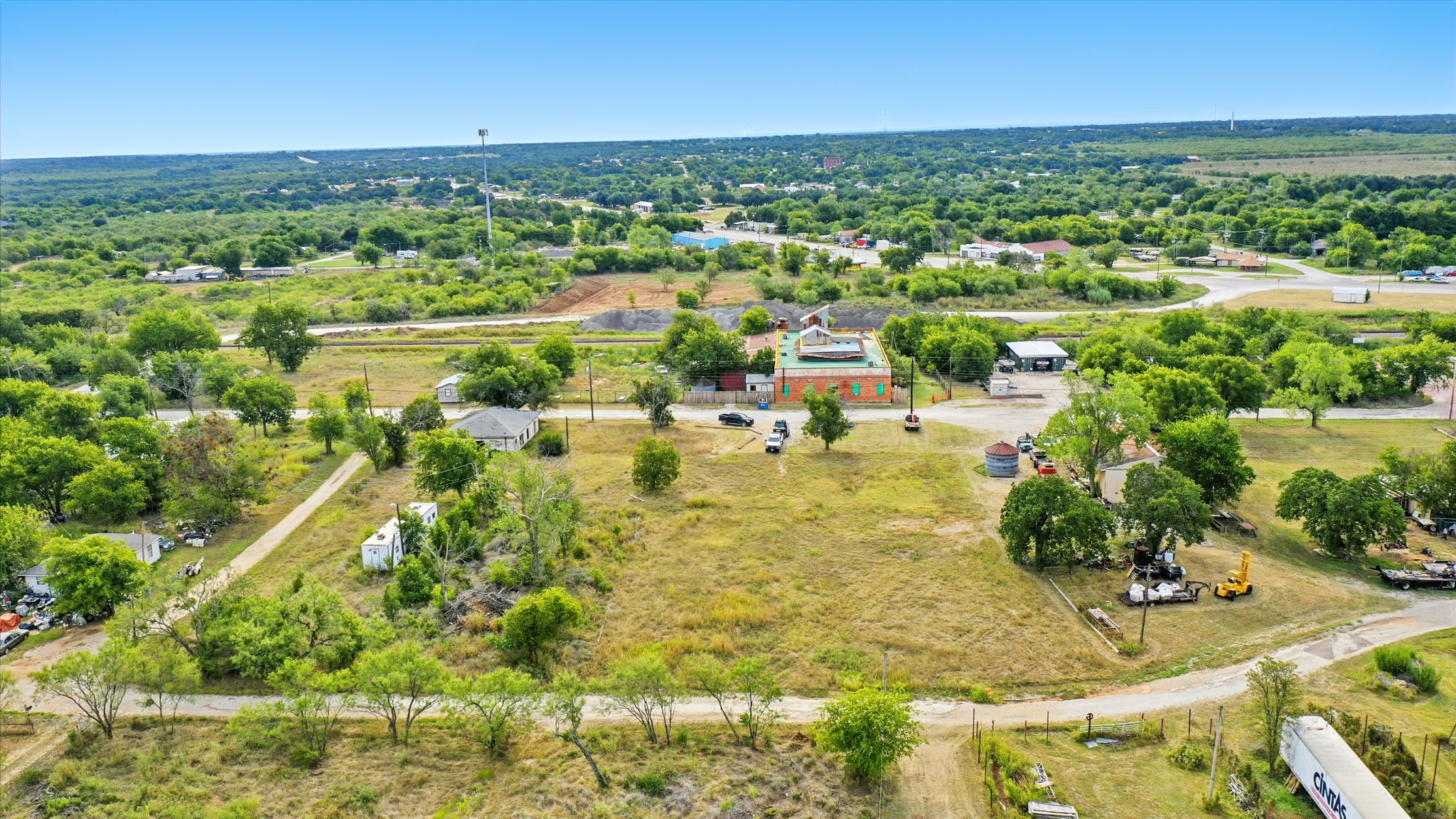 438 Melvin Street Ranger, TX 76470 - Photo 6 of 44 a view of a city with lawn chairs