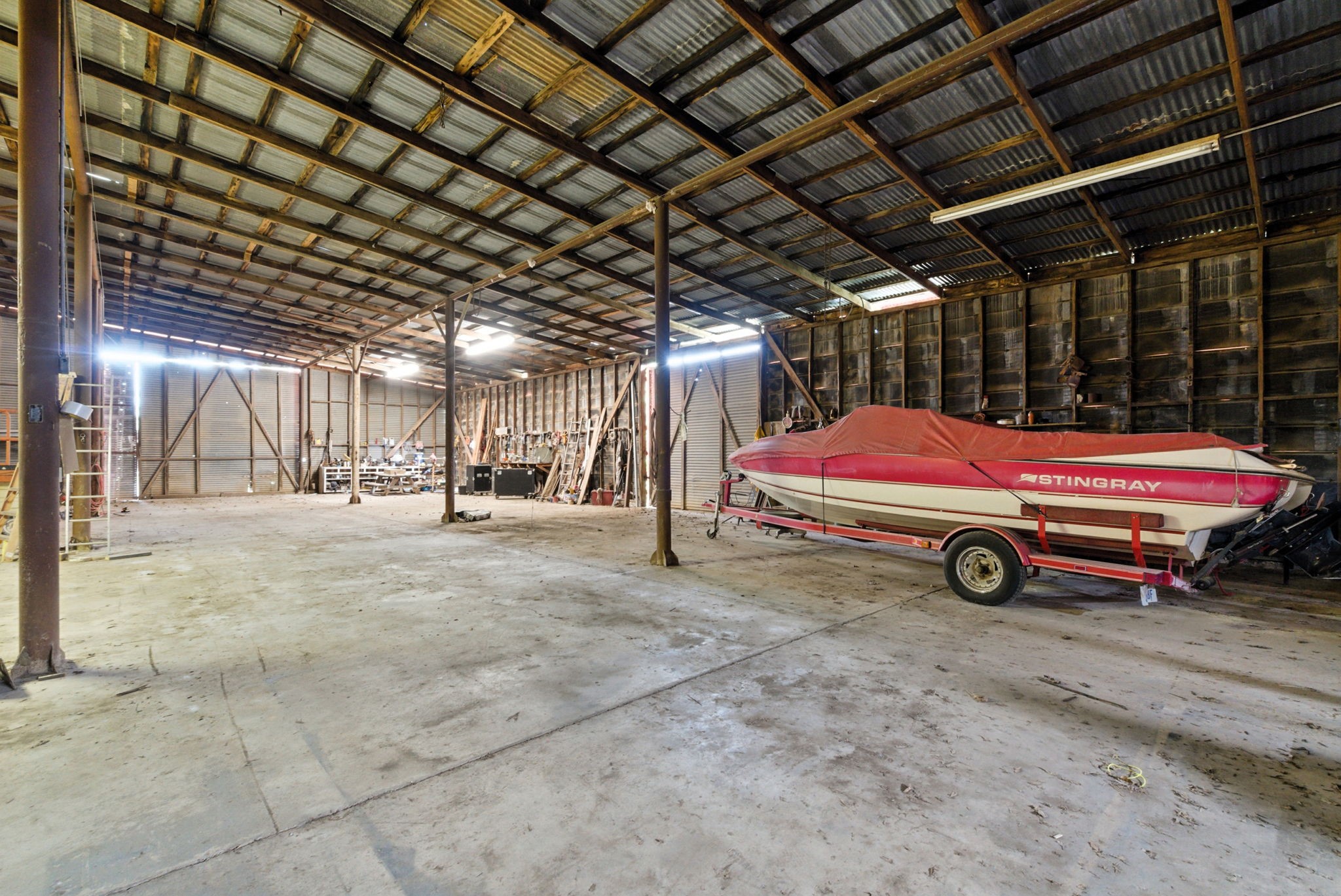 438 Melvin Street Ranger, TX 76470 - Photo 10 of 44 a blue and white car parked in a parking