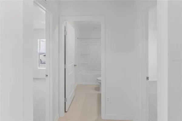 a view of a room that has a window in it