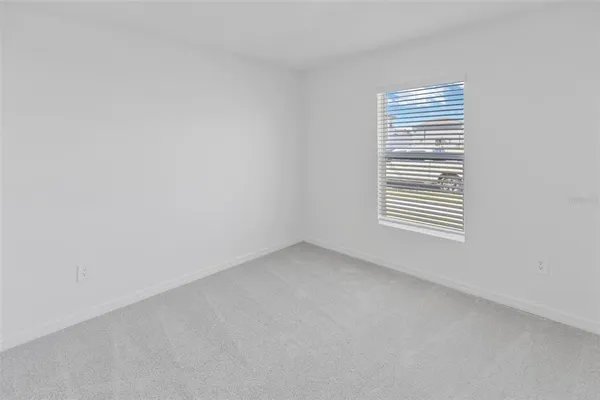 a view of a hallway with a white walls