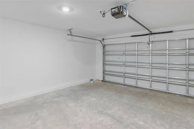 a view of swimming pool with a table and chairs