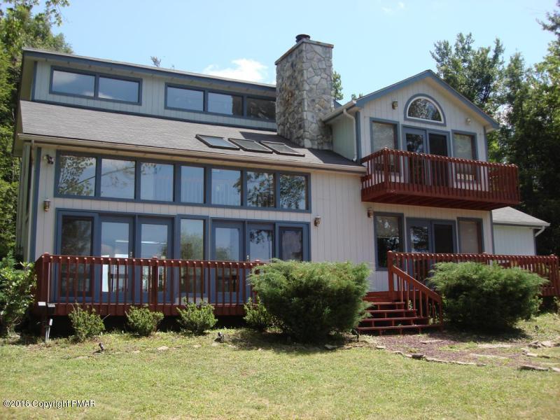 118 Lidio Road Blakeslee, PA 18610 - Photo 1 of 19 a front view of a house with a yard