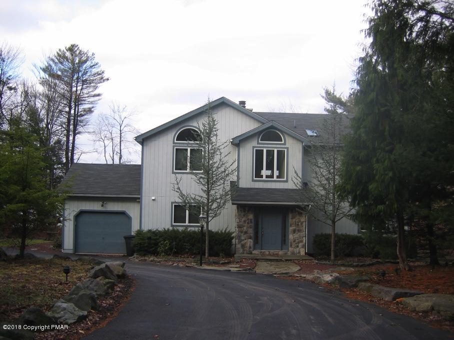 118 Lidio Road Blakeslee, PA 18610 - Photo 16 of 19 a front view of a house with a garden