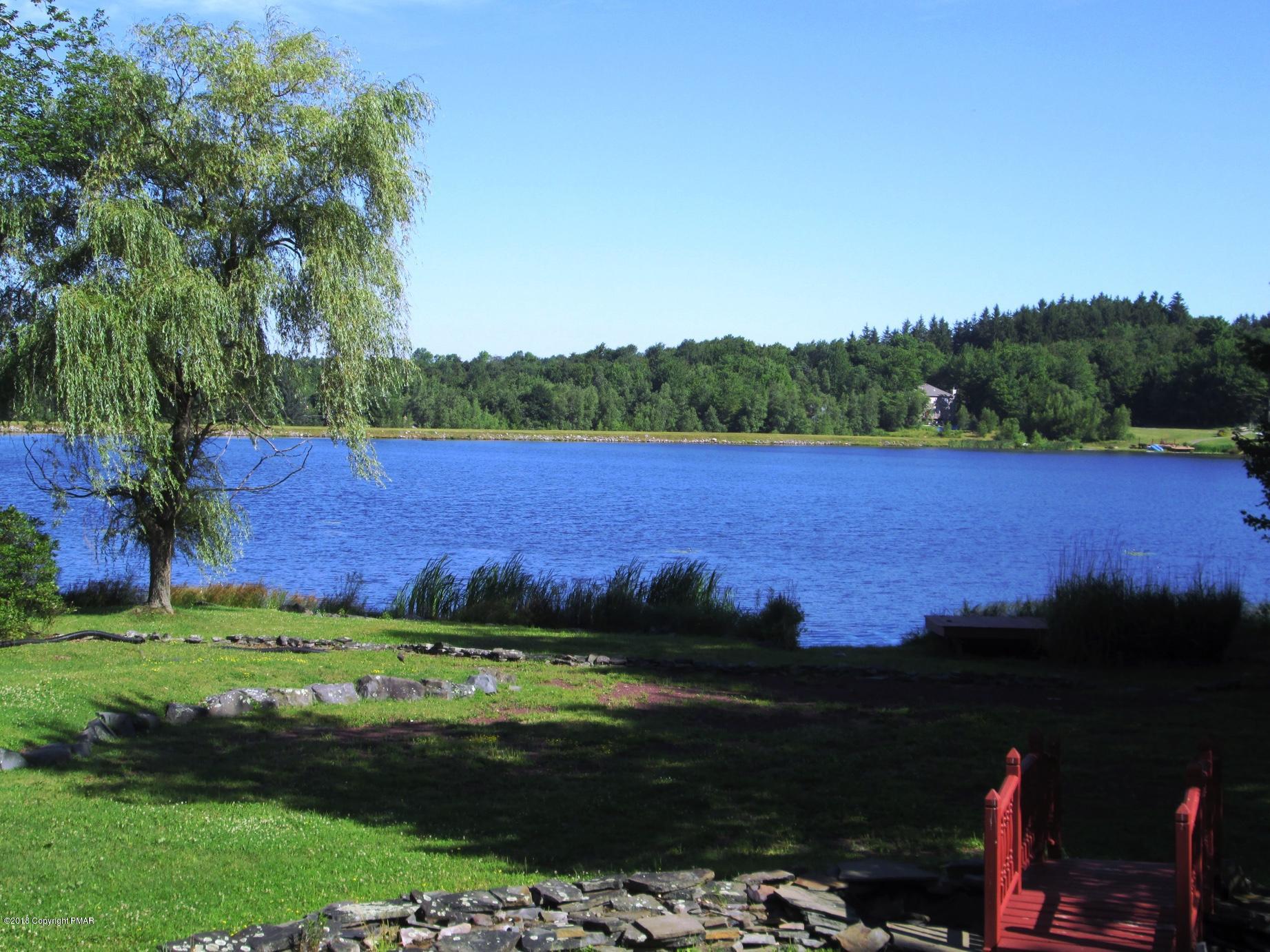 118 Lidio Road Blakeslee, PA 18610 - Photo 17 of 19 a view of a lake in a field