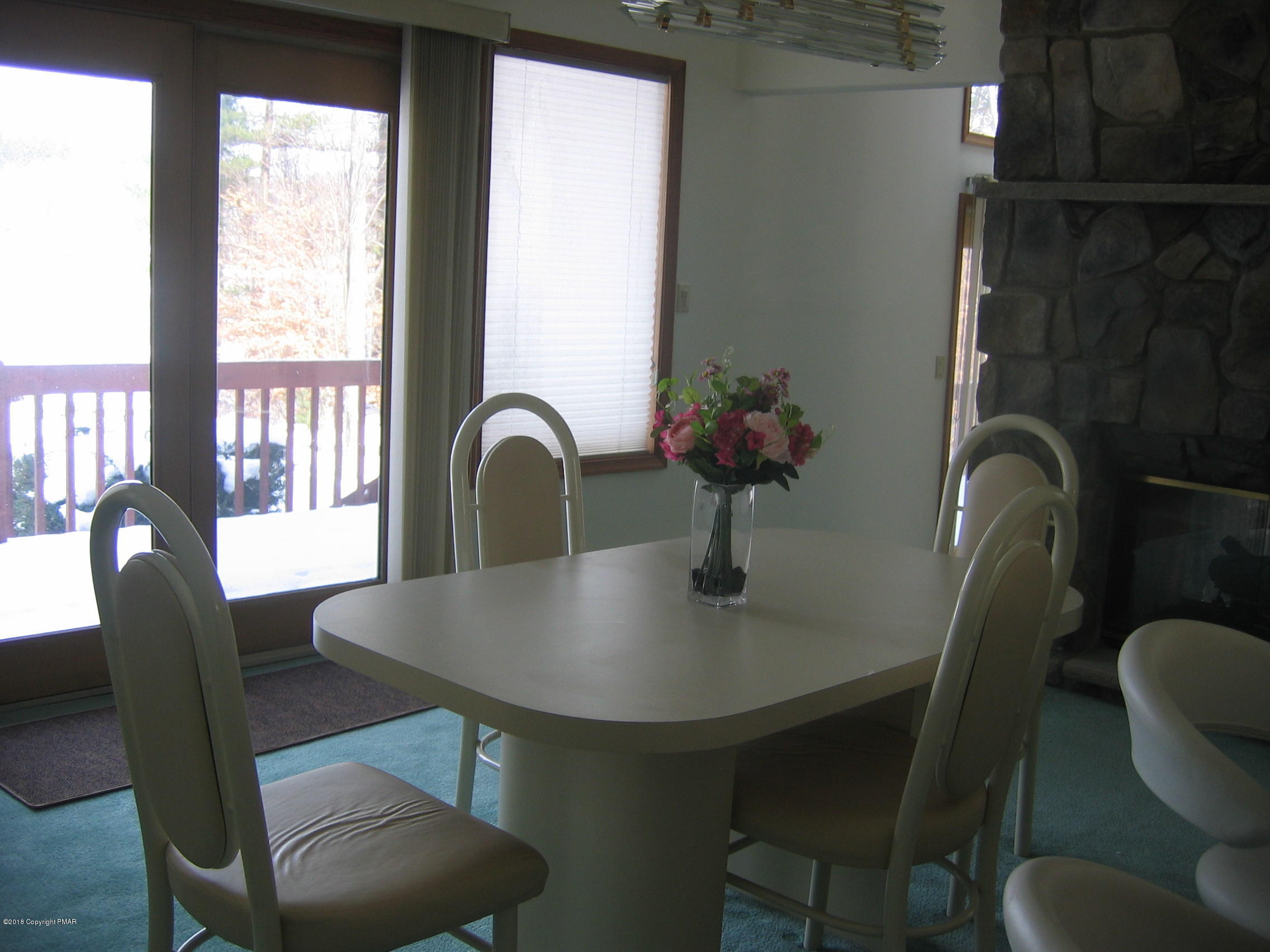 118 Lidio Road Blakeslee, PA 18610 - Photo 6 of 19 a view of a dining room with furniture window and outside view