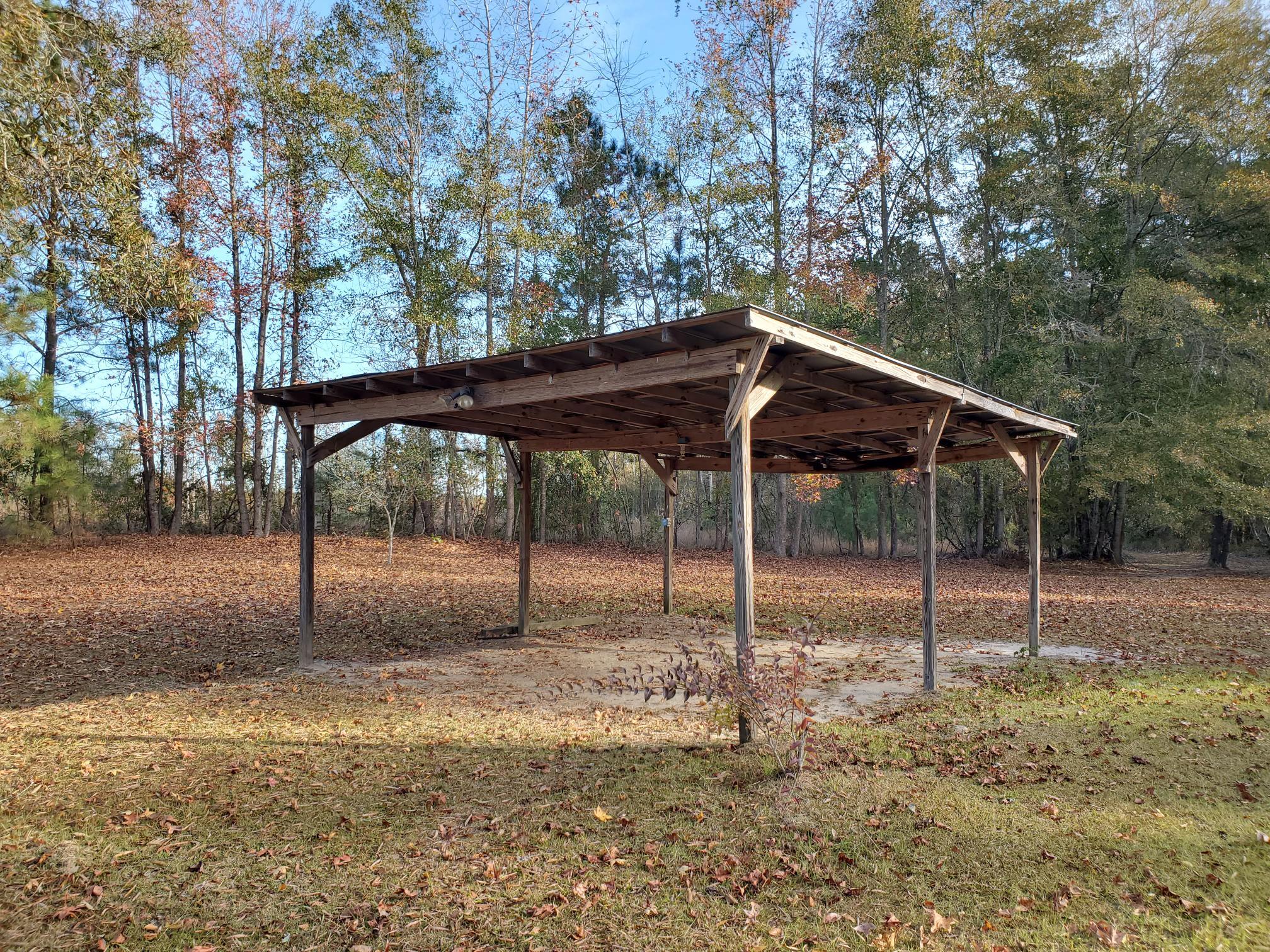 1421 James Loop Road Manning, SC 29102 - Photo 2 of 11 POLE SHED ON PROPERTY