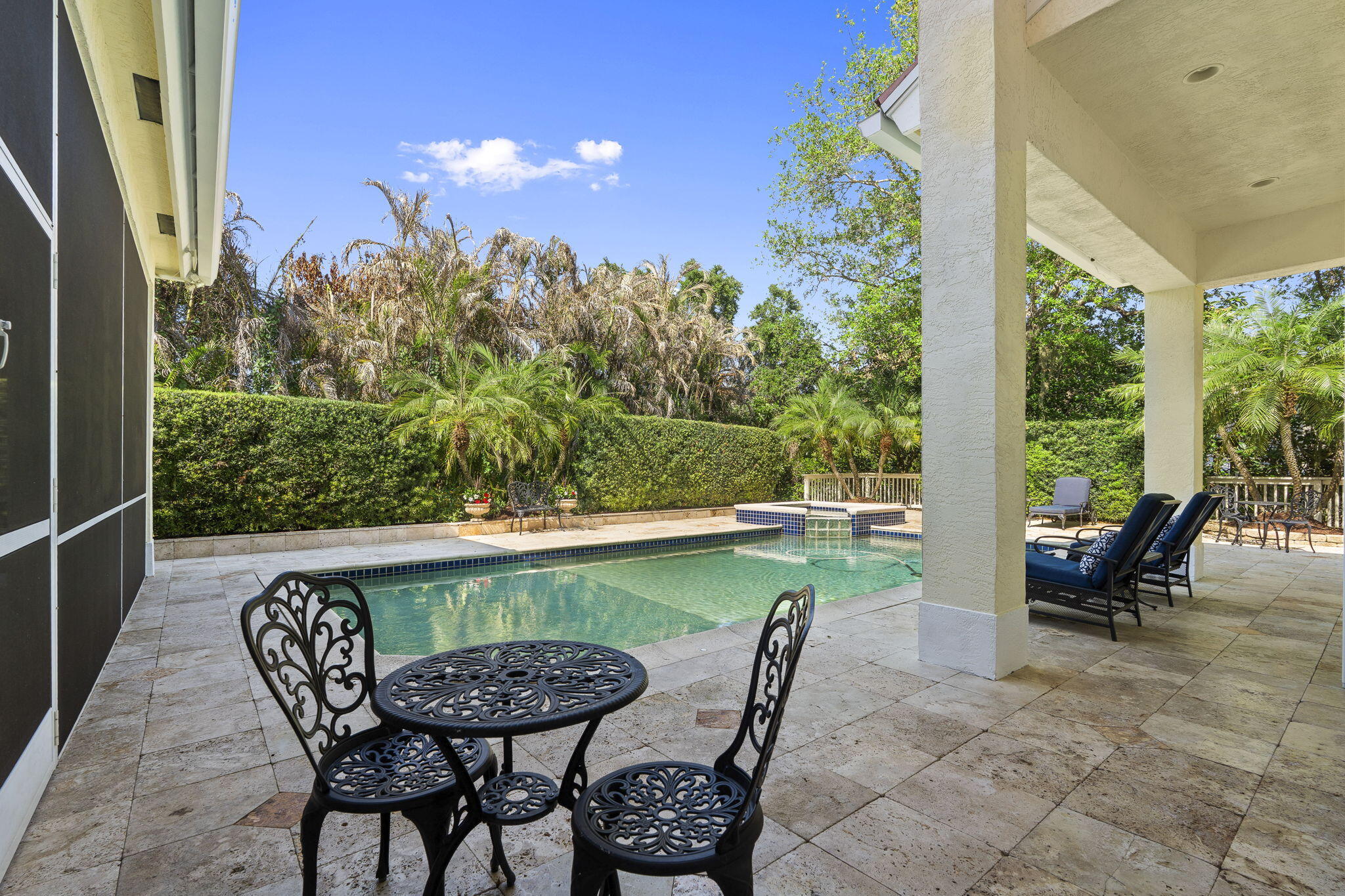 4 Castle Hill Way Stuart, FL 34996 - Photo 38 of 52 a view of a chairs and table in patio